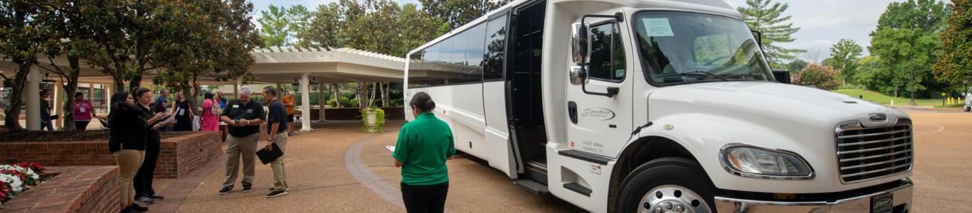 A bus gets ready to transport attendees at the 2024 conference