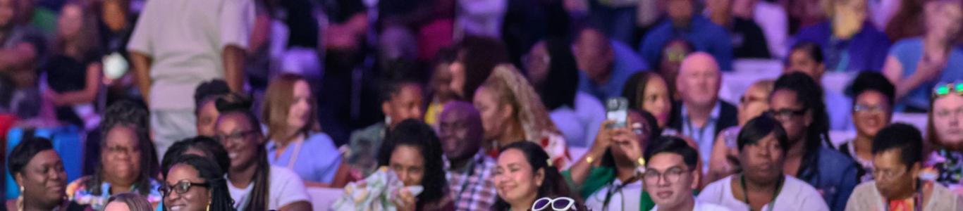 Attendees at the 2025 Conference gather for the keynote address