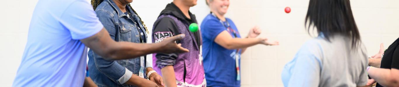 2025 conference attendees have fun in a session