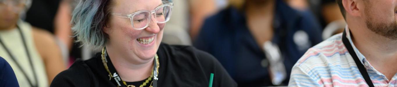 2025 attendees have fun in a session