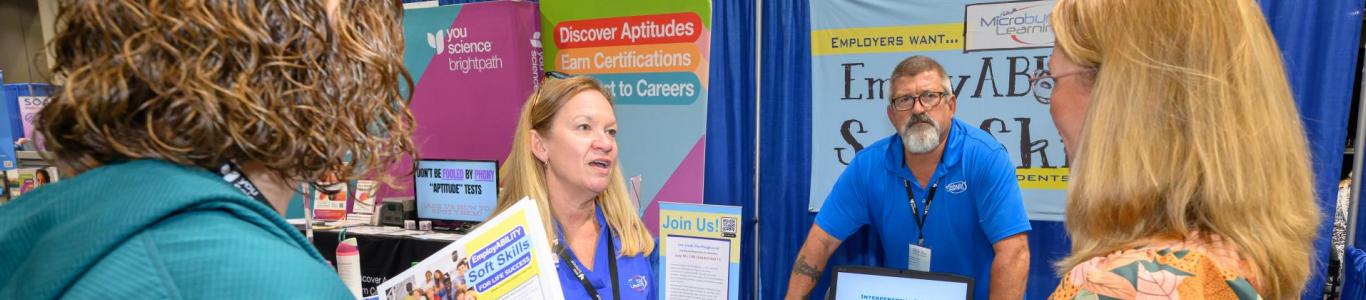 2025 attendees talk to exhibitors