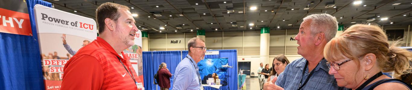 Attendees at the 2025 conference talk to exhibitors