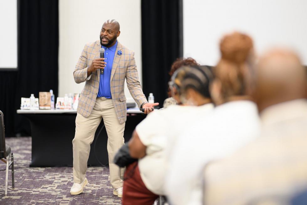 Presenter speaking at the 2025 conference